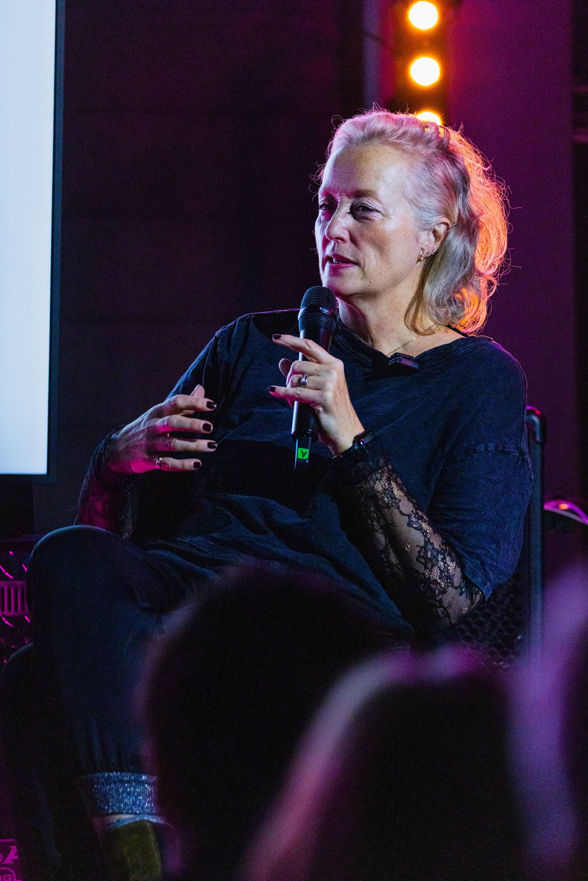 Scarlet Page speaking at the HELD exhibition event